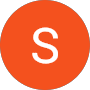 White S on orange background